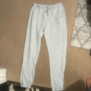 Grey sweat pants size large fits around waist 30